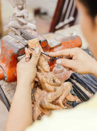 Traditional wooden sculpture carving at Artisans Angkor
